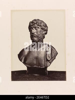 Stephen Thompson, active 19th century, British, Roman Bronze Bust of a Young Man in the British Museum, early 1870s. Albumen print from wet collodion negative on thin, smooth, cream wove paper.   bronze , Roman , still life. Julius Caesar Stock Photo