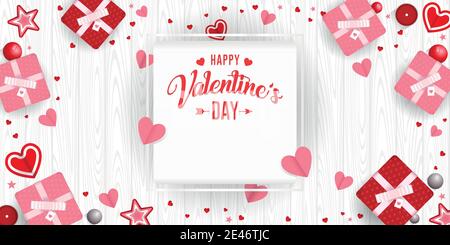 Happy Valentine's day in a square frame on a white background surrounded by gift boxes, hearts, stars and red and pink ball on white wooden background Stock Vector