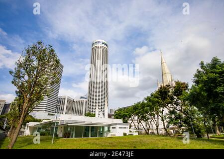 Singapore 17th Jan 2021: the Hotel Swissotel The Stamford and St. Andrew's Cathedral in City hall area. Stock Photo