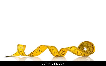 Tape measure sewing tool over white background with selective focus Stock Photo