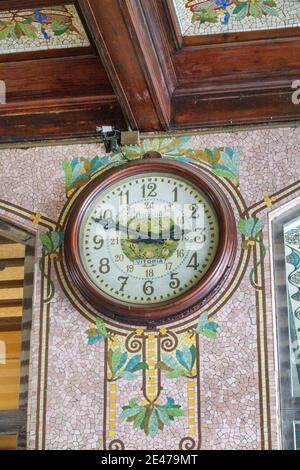 Spain Valencia Hispanic Estacio del Nord Renfe train railway station inside interior Art Nouveau wall mosaic clock landmark Stock Photo