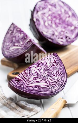 Fresh red cabbage on white table. Stock Photo