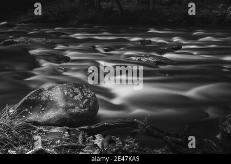 Grayscale shot of the rocky Tennessee river in the U Stock Photo