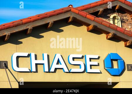 Chase sign and trademark logo on bank local branch. JPMorgan Chase Bank, N.A., is a national bank headquartered in Manhattan, New York City- San Jose, Stock Photo