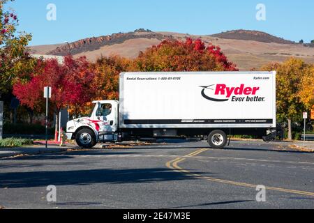 Ryder truck crossing the street. Ryder System, Inc. is an American provider of transportation and supply chain management products - San Jose, Califor Stock Photo