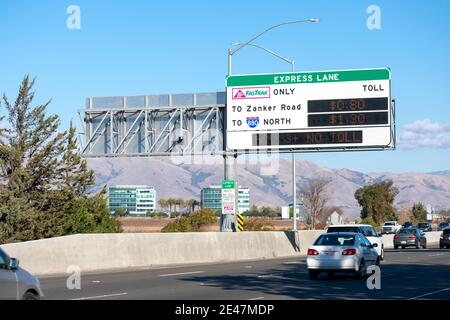 FasTrak express lane sign on highway. FasTrak is an electronic toll collection ETC system on toll roads, bridges, and high-occupancy toll lanes in Cal Stock Photo