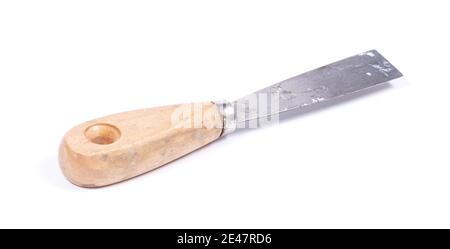 Old used putty knife isolated on white background Stock Photo