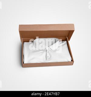 White textured polo mockup presentation, folded into a box, front view, isolated on background. Blank men's t-shirt template for design, advertising i Stock Photo