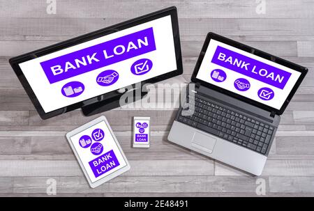 Bank loan concept shown on different information technology devices Stock Photo