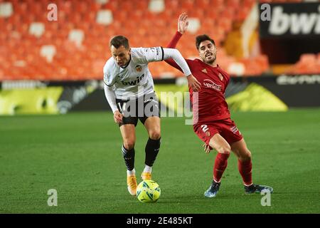 Denis Cheryshev of Valencia CF and Nacho Vidal of Osasuna during the Spanish championship La Liga football mach between Va / LM Stock Photo