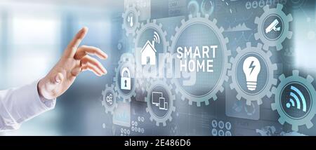 Smart home automation interface application control panel. Internet and technology concept. Businessman pressing button Stock Photo