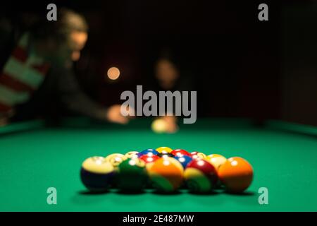 Racked and ready billiards balls. Stock Photo