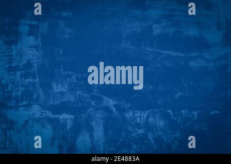Abstract blue cement and background. Dark grunge concrete texture. Stock Photo