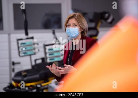 Mainz, Germany. 22nd Jan, 2021. The Prime Minister of Rhineland-Palatinate, Malu Dreyer (SPD), visits an ambulance station of the German Red Cross in Mainz. A special stretcher was presented, which can be used to transport corona patients. Credit: Boris Roessler/dpa/Alamy Live News Stock Photo