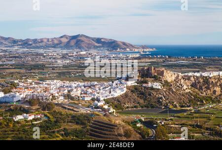 View of Salobrena town and castle with coast behind and port of Motril Stock Photo