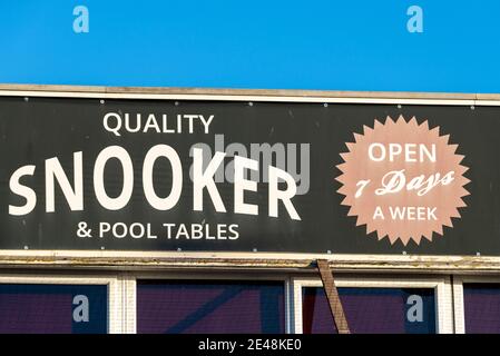 Snooker Hall above New York amusement arcade early in the morning on a sunny day on Marine Parade, Southend on Sea, Essex, UK. Blue sky Stock Photo