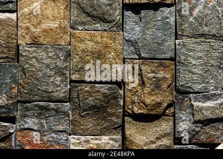 Brown red monochrome surface of granite wall close-up. Natural decorative stone background Stock Photo
