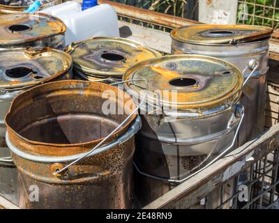 Empty tin paint bucket with rust Stock Photo