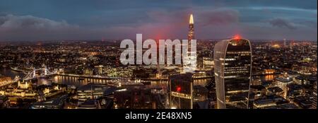 London night aerial panorama from the Gherking looking at the Shard and Tower Bridge Stock Photo