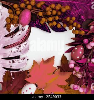 Happy Easter. Congratulatory easter background. Easter eggs and flowers. Flat lay. Nature concept. Stock Photo