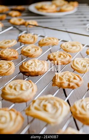Danish butter cookies over a metal grid Stock Photo
