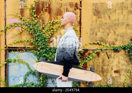 Side view portrait of a skateboarder Stock Photo