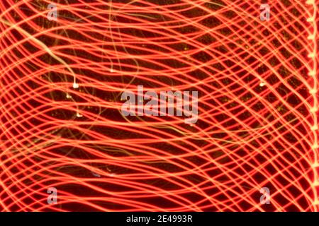 Abstract background of vibrant soft focused curvy lines creating multi-layered effect. Stock Photo