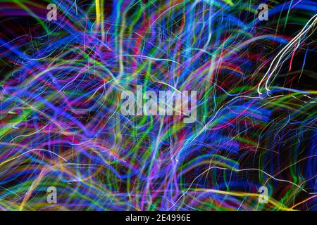 Abstractulti-layered effect of red, pink, green, blue, and yellow created by LED light trails Stock Photo