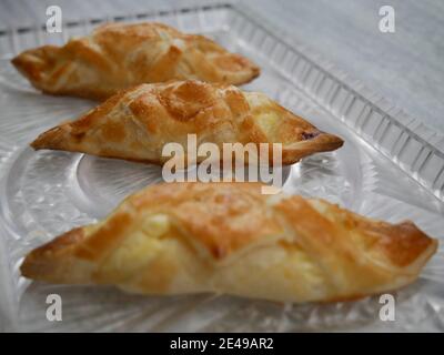 Leaf dough with a sweet cheese filling. Absolutely luxurious snack. Stock Photo