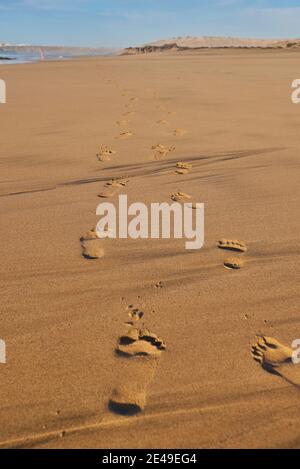 Footprints in the sand, sandy beach Playa del Castillo, Playa del Aljibe de la Cueva, Fuerteventura, Canary Islands, Spain Stock Photo