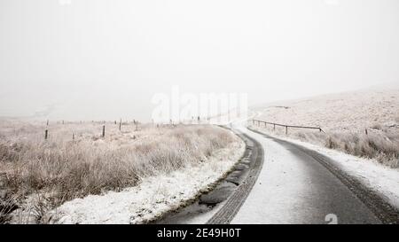 Near Ffair Rhos,, Ceredigion, Wales, UK. 22nd January 2021 UK Weather: After a dry but cold day the weather turns to snow over the Cambrian mountains and surrounding areas near Ffair Rhos in mid Wales. © Ian Jones/Alamy Live News Stock Photo