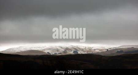 Near Ffair Rhos,, Ceredigion, Wales, UK. 22nd January 2021 UK Weather: After a dry but cold day the weather turns to snow over the Cambrian mountains and surrounding areas near Ffair Rhos in mid Wales. © Ian Jones/Alamy Live News Stock Photo