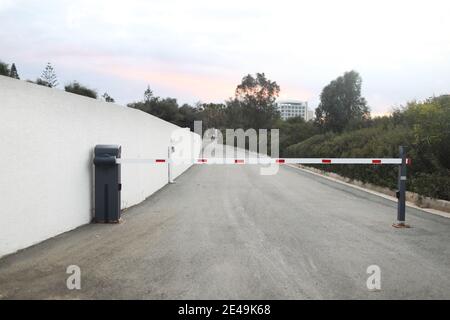 parking barrier system, automatic car park security system. barrier to the closed area of the hotel. Stock Photo