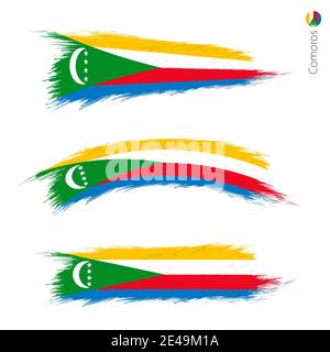 Set of 3 grunge textured flag of Comoros, three versions of national country flag in brush strokes painted style. Vector flags. Stock Vector