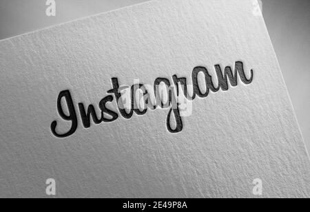 Instagram logo icon on paper texture Stock Photo