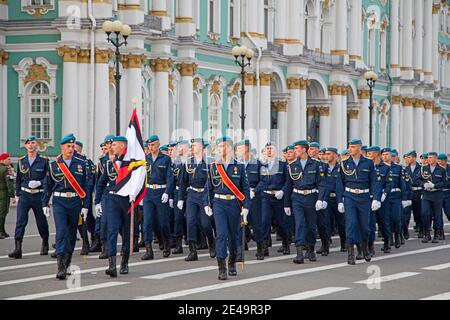 Military parade of Russian Airborne cadets wearing telnyashkas and blue berets marching in front of the Hermitage in Saint Petersburg, Russia Stock Photo