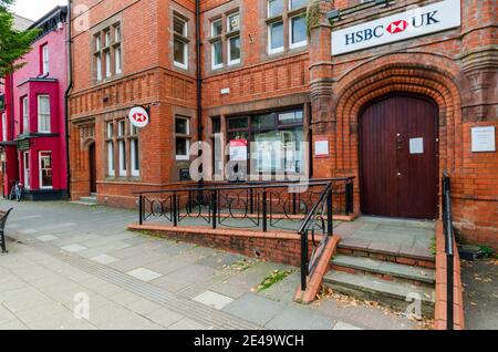 Bala; UK: Sep 20, 2020: HSBC is an international banking corporation with branches throughout the UK. Seen here is their Bala branch, located on the H Stock Photo