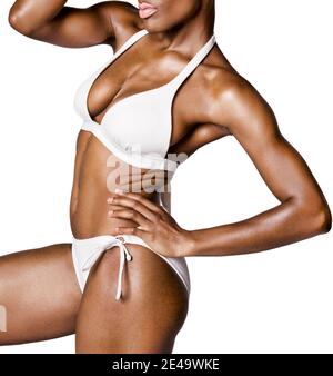 Young african woman posing in white bikini Stock Photo