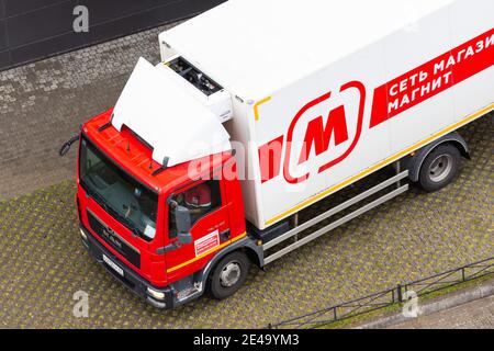 Semi-trailer truck supply of food products to a large supermarket chain of stores Magnit in Russia, Saint-Petersburg. 26 august 2020 Stock Photo