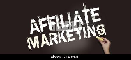 Affiliate Marketing - words written with chalk on blackboard. Business model concept. Stock Photo