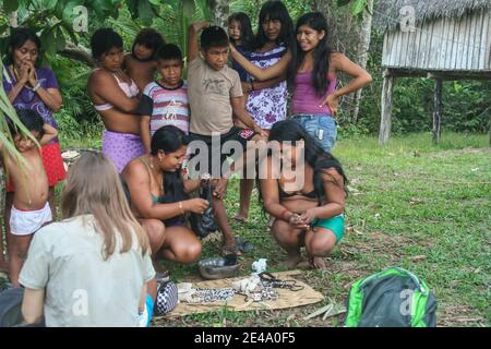 Atalaya do Norte, Brazil- Nov 15 2013: Family of Indians.  Vale do Javari Indigenous Territory. Amazon, Amazonia, South America. Stock Photo