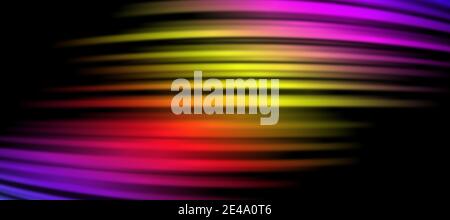 Glowing multicolored and blurred light stripes in motion on a dark background. Abstract composition. Stock Photo