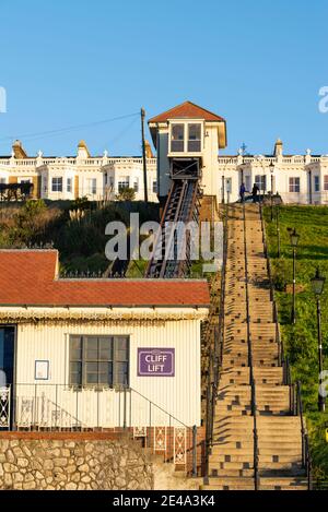 Southend on Sea Cliff Lift, funicular railway up cliffs with gardens. Restored vintage tourist attraction in blue sky. Stations at top and bottom Stock Photo