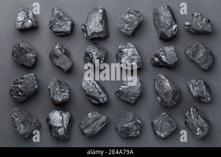 Coal lumps over black background. Top view Stock Photo