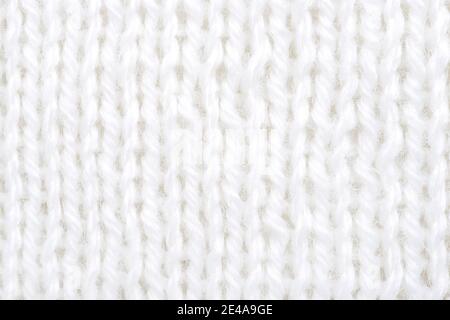 Close-up of hand made white cotton knit texture. Stock Photo