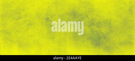 Abstract yellow green background with soft bright gold center glowing with light colors and dark blue green border with blurred mottled texture Stock Photo