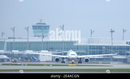 MUNICH, GERMANY - 11 OCTOBER 2015: Lufthansa Airbus A330-300 passenger plane taxiing at Munich Airport MUC Stock Photo