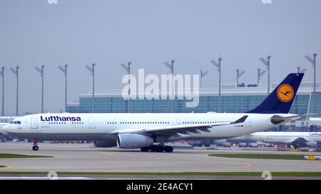 MUNICH, GERMANY - 11 OCTOBER 2015: Lufthansa Airbus A330-300 passenger plane taxiing at Munich Airport MUC Stock Photo