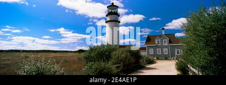 Lighthouse in the field, Highland Light, Cape Cod National Seashore, North Truro, Cape Cod, Barnstable County, Massachusetts, USA Stock Photo