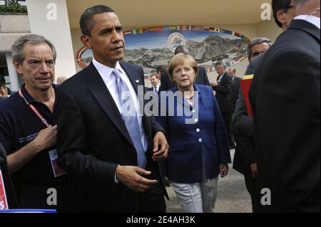 US President Barack Obama and German Chancellor Angela Merkel seen at G8 Summit at the Guardia Di Finanza School of Coppito in L'Aquila, Italy, on July 8, 2009. Photo by Elodie Gregoire/ABACAPRESS.COM Stock Photo